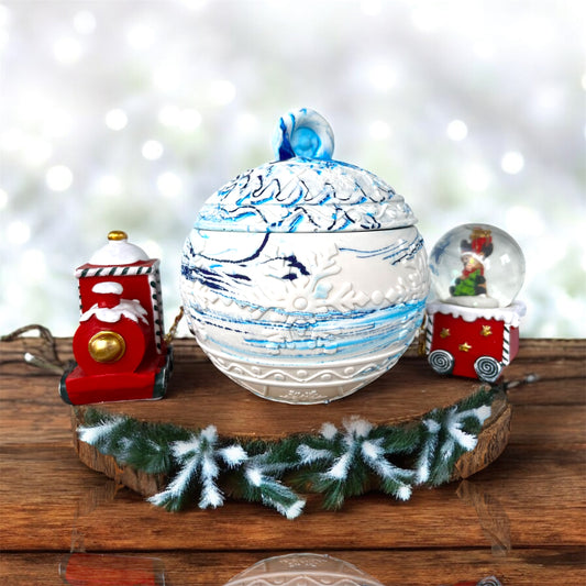 La boule de Noël orné de flocons